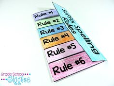 a bookmark made out of colored paper with the words rules and rules on it