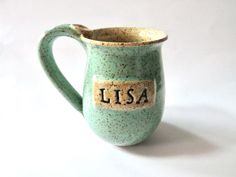 a ceramic mug with the word usa written on it