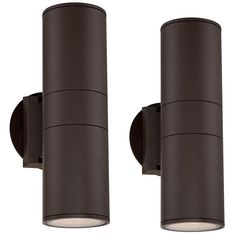 two lights that are attached to the side of a wall mounted fixture, one is black