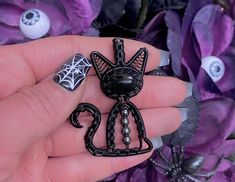 "NOTE ON PROCESSING/SHIPPING TIME: This listing is for one (1) made-to-order black obsidian Halloween black cat pendant. Due to the unique nature of handmade jewelry, your pendant will be in the same design shown, but will not be exact to the example photo. Since this item is made-to-order, I will need 1-2 weeks of processing time to create your pendant before shipping it off.  For domestic orders in the United States, I use a 3-7 day First Class delivery mail service. You can expect to receive Spooky Black Necklace For Gift, Spooky Black Jewelry Gift, Halloween Black Cat Design Jewelry, Handmade Black Witchy Necklace, Wire Wrapped Moon, Black Star Sapphire, Halloween Kitty, Sapphire Cabochon, Lion Necklace