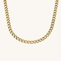 Our Chic Classic Curb Chain is made of hypoallergenic stainless steel with a gold plated finish. It’s handcrafted in Los Angeles, California and each piece is quality-guaranteed. Wear it alone or layered with other Cuban link chains for an edgy look that doubles as everyday casual wear. The Cuban link style is perfect for layering or even wearing solo. ✔Hypoallergenic ✔Quality Guaranteed ✔Water Resistant MATERIAL: stainless steel dipped in real 18k gold COLOR: gold CHAIN LENGTH ON MODEL: 18 inch Gold Modern Cuban Link Necklace With Curb Chain, Modern Gold Curb Chain Necklace, Gold Cuban Link Necklace With Cable Chain As Gift, Modern Gold Cuban Link Curb Chain Necklace, Gold Cuban Link Necklace With Cable Chain, Stainless Steel Gold Chain Necklace For Everyday, Everyday Stainless Steel Necklace With Gold Chain, Classic Stainless Steel Necklace With Gold Chain, Gold Stainless Steel Chain Link Necklace