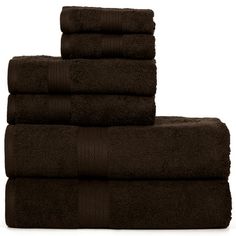 four towels stacked on top of each other in dark brown color, one folded and the other rolled up