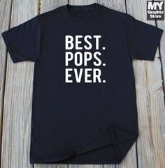 a t - shirt that says best dad ever on the front, and in white letters