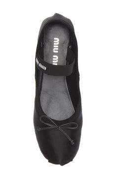 A logo-branded strap secures this Italian-crafted flat that features a silk-softened upper complete with a dainty bow. Elasticized mary jane strap Leather and textile upper and lining/leather sole Made in Italy Designer Shoes Miu Miu Flats, Miu Miu Logo, Black Ballerina, Miu Miu Shoes, Black Ballet Flats, Womens Ballet Flats, Mary Jane Flats, Miu Miu Ballet Flats, Ballet Flat