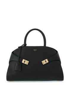 black calf leather gold-tone hardware logo print to the front main compartment circular top handles internal zip-fastening pocket Salvatore Ferragamo Handbags, Ferragamo Bag, Salvatore Ferragamo Bags, Ferragamo Handbags, Black Leather Tote Bag, Dolce E Gabbana, Louis Vuitton Shoulder Bag, Black Tote Bag, Black Handbags