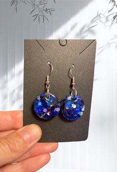 handmade resin earrings Silver Resin Drop Earrings, Nickel-free Silver Resin Earrings, Handmade Blue Resin Earrings, Silver Resin Earrings As A Gift, Silver Resin Earrings For Gift, Silver Resin Earrings For Party, Blue Resin Jewelry For Parties, Blue Resin Jewelry For Party, Silver Glitter Round Earrings