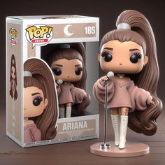 a pop vinyl figure is shown in front of a box with an image of aria on it