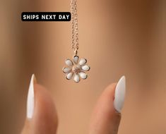 🎂 Perfect Birthday & Christmas Gifts 🎂   Seeking that **birthday gift for her** or a unique **personalized gift for mom**? Dive into the world of daisies, a symbol of pure beginnings and innocence. Our Minimalist Daisy Necklace intertwines the simplicity of a daisy with the luxury of handcrafted jewelry. A piece that will remind her of sunlit days and nature's joy, it's the embodiment of sentiments she'll treasure. 🚀✈️ Swift & Secure Shipping 🚀✈️   Experience prompt shipping with no delays, Nickel-free White Jewelry For Birthday Gift, Tiny Flower Jewelry For Gifts, Tiny Flower-shaped Jewelry Gift, Flower-shaped Jewelry For Gifts, White Necklace Birthday Gift, White Necklace For Birthday Gift, White Jewelry Birthday Gift, White Jewelry For Mother's Day Birthday Gift, White Flower Jewelry For Birthday