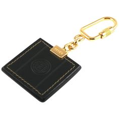 Fendi Logo Keychain from the 1990's with original tag. Branded on both sides, tag is made of leather with signature stripe textile on back. 5.25" x 2.25". Excellent condition. Fendi Logo, Small Accessories, Both Sides, Fashion Handbags, On Back, Purse Wallet, Fendi, Chanel, Textiles