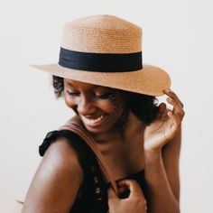 The Panama Piper Straw Hat is light-colored, lightweight, and breathable and perfect to dress up or casually this summer. This adjustable hat features a wide detailed band in either brown or black to pair with any outfit of your choosing. Take it to the beach or a summer wedding offering sun protection and style! 23.5" Adjustable Circumference 3" Wide Brim 2 Color options, brown or black PS Metal Tag on hat 100% Paper material Nickel And Suede, Metal Tag, Short Denim Skirt, Hat Style, Metal Tags, Paper Material, Flip Flop Shoes, Top Graphic Tees, Boho Summer