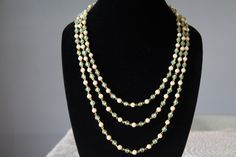 This seafoam green stone necklace with shell pearls has been handcrafted by the artisans of India and can be used as rani haar or as a necklace for your dulha.  Customizations are possible! Please get in touch if you are looking for different colour combinations or the number of strands. Necklace Closure: Dori CARE TIPS 1. Keep away from moisture, perfume and oils. 2. Store in cotton or zip lock bags or airtight boxes. 3. Spot cleaning only with a dry cotton cloth. 4. Jewellery is the last thing Green Pearl Necklace With Gemstone Beads For Wedding, Handmade Bohemian Green Bridal Necklace, Handmade Green Bohemian Bridal Necklace, Bohemian Handmade Green Bridal Necklace, Handmade Jade Necklace For Wedding, Rani Haar Long Necklaces, Small Forehead, Rani Haar, Green Stone Necklace