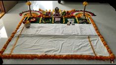 the altar is decorated with flowers and candles