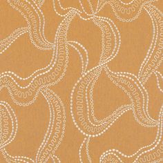 an orange background with white swirls and dots