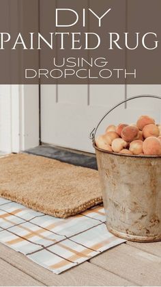 a bucket filled with potatoes sitting on top of a rug