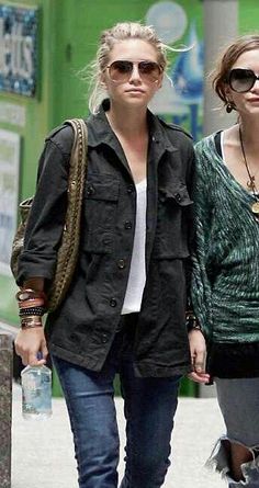 two women walking down the street together