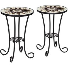 two metal tables with flower designs on them