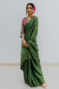 Emerald green saree with contrast woven stripes and zardozi embroidered border. Paired with printed magenta unstitched blouse fabric.
Component: 2
Fabric: Handloom Munga Silk
Color: Green
Blouse fabric: 1 metre
Note: Blouse worn by the model is not for sale - Aza Fashions Striped Saree, Saree Green, Saree Blouses Online, Saree For Women, Silk Saree Blouse, Green Saree, Blouse For Women, Blouse Online, Designer Gowns