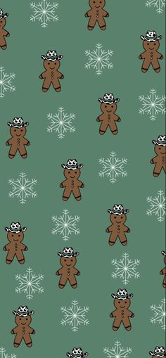 a green background with brown teddy bears and snowflakes