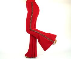 Red Bell bottoms women,Stretchy flare pants,Native American Pants,Hand Made,Birthday Gift,Back to School I created this so trendy boho bell bottoms from stretchy jersey and decorated with native American trimmed. You can wear this solid red bell bottoms during the day or to go to party,festival and club.Also you can wear this so comfortable solid red bell bottoms to go to special occasions. You can choose size during the purchasing.Also avaliable plus size like XXL. SIZE INCHES; Extra Small (US Red Bell Bottoms, Plus Size Bell Bottoms, 70s Clothing, Festival Pants, 2020 Fashion Trends, Trendy Boho, Solid Red, Stylish Plus, Festival Outfits