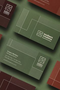 business cards designed to look like tennis court with red and green squares in the background