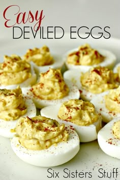 an easy deviled eggs recipe on a white plate