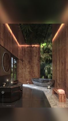 the bathroom is decorated in bamboo and features a large tub with lights on it's sides