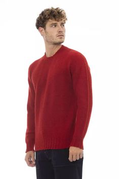 Elevate your wardrobe with this striking Alpha Studio crewneck sweater, a perfect blend of timeless design and luxurious comfort. Crafted from the finest 100% wool, this bold red piece is meticulously made in Italy, featuring cozy long sleeves and a refined ribbed collar, cuffs, and bottom. Ideal for those who desire a pop of color with a sleek, trendy edge. Material: Wool Country of Origin: IT Color: Red Haute Couture Brands, Trendy Crewneck, Crewneck Design, Cozy Fits, Red Wool, Sweaters Crewneck, Studio S, Crewneck Sweater, Wool Sweater