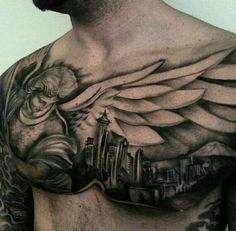 a man's chest with an angel and cityscape tattoo on the side