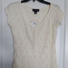 Gorgeous International Concepts Short Sleeve Blouse With Button Front. Lacey Boucle Design In Beautiful Neutral Cream Shade. Perfectly Pairs Casually With Jeans Or Shorts Or As A Dressy Top Over A Skirt Or Slacks. Fitted Lace Blouse With Button Closure, Spring Fitted Crochet Top With Buttons, Spring Lace Tops With Buttons, Fitted Crochet Top With Buttons For Spring, Fitted Lace Button-up Top, Casual Lace Top With Button Closure, Casual Lace Tops With Button Closure, Lace Button-up Tops With Button Closure, Lace Button-up Top