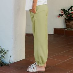 Elevate your everyday look with the Green Pintuck Tapered Leg Pants. Their sleek design and pintuck detailing add a touch of sophistication to any outfit. Product code: CAA02D4A026HH Jersey Pants, Utility Pants, Green Material, Bottom Clothes, Tailored Trousers, Pin Tucks, Office Wear, The Chic, Casual Fits