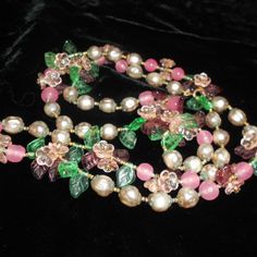 Very Beautiful And Early Miriam Haskell Necklace Designed By Frank Hess, Made In The Early 1940s Era. It Is Still On The Original Stringing With Tiny Brass Beads, Little Glass Flower Petals And Glass Flowers With Little Rhinestones In The Middle, Poured Glass Pink Beads, The Flower Clusters Are Surrounded By Glass Pearls With Brass Fittings On Either End. The Necklace Is Not Signed; Nor Should It Be For This Era. We Know By The Pearls And Fittings It Is Unquestionably Haskell And Frank Hess Desi Miriam Haskell Necklace, Miriam Haskell Jewelry, Miriam Haskell, Pearls Necklace, Brass Fittings, Glass Flowers, Old Jewelry, Pink Beads, Flower Petals