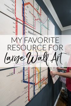 a man standing next to a wall with the words my favorite resources for large wall art