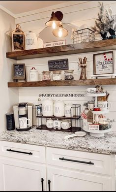 the shelves above the kitchen counter are filled with coffee