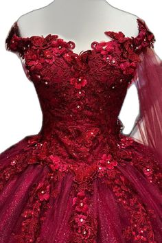 a red ball gown with flowers on it