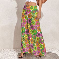 Wide Leg Pants, Retro Pants, Wide Leg Pants Women, 70s Style Pants, 70s Inspired pants, Neon Pants, Floral Pants, Hippie Pants, Boho Pants Designed in California, Handmade to order from overseas I designed this for those who loves the 70s boho hippie style. Super cute neon floral print. I am designing a matching top as well. Great for every day wear or at the beach or any fun parties. Pair it with platform chunky heels, for a super funky style. Hope you enjoy my designs.  Material: Made of 100% Retro Wide Leg Bottoms For Spring, Casual Wide Leg Pants With Retro Print, Retro Wide Leg Pants For Spring, Retro Wide Leg Full Length Pants For Spring, Vintage Non-stretch Wide Leg Pants, Retro Wide-leg Bottoms With Elastic Waistband, Retro Wide Leg Bottoms With Elastic Waistband, Vintage Wide-leg Pants For Spring, Wide Leg Bottoms With Retro Print For Summer