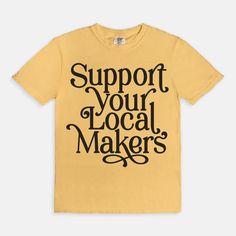 Support Your Local Makers Tee – We The Babes Basic Organic Cotton T-shirt With Graphic Print, Organic Cotton Short Sleeve T-shirt With Letter Print, Yellow Band Merch T-shirt With Letter Print, Oversized Yellow T-shirt With Letter Print, Yellow Relaxed Fit Soft-washed T-shirt, Yellow Soft-washed Relaxed Fit T-shirt, Retro Crew Neck Top In Organic Cotton, Retro Organic Cotton Crew Neck Top, Basic T-shirt With Letter Print In Ring-spun Cotton