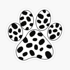 a black and white animal paw print sticker on a white background, with spots