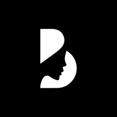 a woman's face is shown in the shape of a letter b on a black background