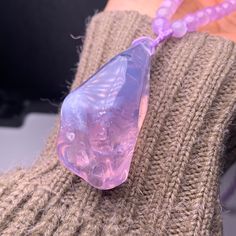 Name: 64.1g Natural purple lavender quartz necklace with 108 lavender amethyst bead chains Material:Lavender Quartz Weight :64.1 g approx Size :Pendant：49mm*22mm*20mm approx Chain：6mm 70cm approx ①Lavender Moon Quartz or Lavender Quartz is commonly referred to as a type of amethyst but it is surprisingly not, it is not a chalcedony either and comes in a pinkish purple color. ②Lavender quartz is known as a stone of love and is colored with manganese and titanium making it actually a type of rose Lavender Amethyst Crystal Necklaces With Round Beads, Lavender Amethyst Crystal Necklace For Healing, Lavender Amethyst Necklaces For Healing, Moon Quartz, Lavender Amethyst, Lavender Quartz, Pinkish Purple, Purple Lavender, Amethyst Beads