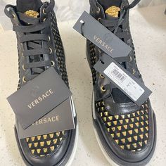 Selling Black & Gold Versace Sneakers Size: 13.5 Message For Serious Inquiries Only Price Negotiable Versace Loafers, Versace Slippers, Black And Gold Sneakers, Versace Chain, Brown Leather Sneakers, Shoes Men Sneakers, Versace Sneakers, Versace Shoes, Gold Sneakers