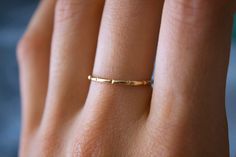 Whimsical handmade chisel band ✨ Handmade 14k gold fill or 925 Sterling Silver soldered band, which are perfect for everyday wear, and those of you who are minimalistic! Beautiful statement piece, which gives off an etherial look 🦋✨ MATERIAL: 14/20 (karat/purity) gold fill OR 925 Sterling Silver THICKNESS: 1.32 mm Each are uniquely hand crafted!💕 Adjustable Minimalist Gold Bands, Delicate 14k Gold Bands For Gifts, Classic Handmade Gold Stackable Rings, Minimalist Gold Bands For Gifts, Dainty Bands With Simple Design For Gift, Minimalist Gold Band As Gift, Handmade Minimalist Midi Rings In Yellow Gold, Handmade Minimalist Gold Midi Rings, Handmade Minimalist Yellow Gold Midi Rings