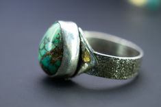 In the process of manifesting your own future you create your own luck, not just through your thoughts but also through your actions. This lovely green turquoise is a wonderful reminder of the beauty you can create for yourself.   Sterling silver; natural Turquoise. Size 9 1/2 Artisan Turquoise Chrysoprase Rings, Spiritual Untreated Turquoise Ring Gift, Unique Chrysocolla Rings For Gift, Unique Chrysocolla Rings As Gift, Adjustable Green Turquoise Ring In Spiritual Style, Adjustable Green Turquoise Ring, Spiritual Style, Artisan Green Turquoise Ring As Gift, Artisan Green Turquoise Ring For Gift, Unique Green Turquoise Ring