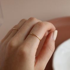 Stack up the beauty - simple, elegant rings forged from 14k solid gold. Choose between a smooth, polished look or hand hammered version. Or don't choose at all - order them both as a pair! Each purchase comes with an elegant, vegan leather box for storing + caring for your jewelry. DETAILS14k Solid GoldRing sizes 4-10 including half sizesSold as a single ring Simple Elegant Rings, Elegant Rings, Simple Band, Single Ring, Solid Gold Ring, Leather Box, Ring Sale, Solid Gold Rings, Elegant Ring