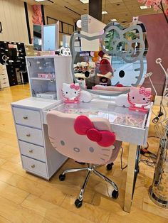 a hello kitty desk and mirror in a store