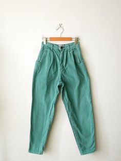 "Vintage Mint Green High waisted Corduroy Tapered Pants. Measurements Total Length : 38\" Waist              : 23\" Hips               : 38\" Rise                : 11 1/2\" Inseam          : 26 1/2\" Condition     : Gently used. There's few stains as shown in the last two pics.  ※Please read the policy before you purchase※" Retro High-waist Corduroy Pants, Green High Rise Cotton Pants, Vintage Corduroy Trousers, Vintage Green Wide Leg Jeans, High Waist Green Jeans, Retro High-waist Corduroy Bottoms, High Waist Retro Corduroy Bottoms, Vintage High-waisted Relaxed Fit Jeans, Vintage Corduroy Pants For Spring