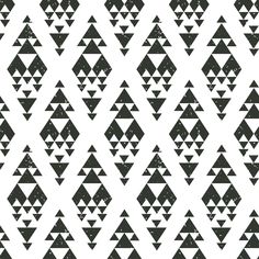 a black and white pattern with triangles