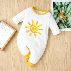 Baby Boys Sun Printed Long Sleeve Romper Baby Boutique Wholesale - PrettyKid White Onesie With Cartoon Print For Playwear, White Cartoon Print Onesie For Playwear, White Long Sleeve Romper For Playwear, White Cotton Winter Onesie, Yellow Long Sleeve Cotton Onesie, Long Sleeve Cream Onesie For Summer, Cream Long Sleeve Onesie For Summer, White Long Sleeve Playwear For Babies, Cream Long Sleeve Summer Onesie