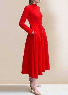 Fabric: Cotton BlendedSize & Fit: Fit: This garment fits true to size.Length: Size S measures 49.92"from shoulder to hemBust: Great for any cup size. Waist: Loose Fit. Comfortable room throughout midsection.Hip: Loose Fit - room for hips. Hand Wash Cold. Red A-line Midi Dress For Winter, Fitted Red Long Sleeve Dress For Winter, Fitted Red Long Sleeve Dress For Evening, Red Midi Dress For Formal Winter Occasions, Red Winter Midi Dress For Formal Occasions, Fitted Cocktail Dress With Pockets, Red Midi Dress For Winter Evening, Fitted Long Sleeve Midi Dress With Pockets, Chic Red Midi Length Long Sleeve Dress