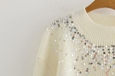 Relaxed Fit 51% Acrylic. 39% Nylon. 7% and 3% Elastane Dry Clean Only Crew Neckline Long Sleeves Sequin Detailing Soft. Knit Fabrication No Closures Not lined Look oh so festive in the Too Cool Sequin Knit Sweater! This cream knit sweater sparkles with orange. hunter green. gold. pink. silver. and yellow sequins across the front. The crew neckline and ribbed edges add just the right touch of detail. Rock your holiday luncheon look by pairing this fun sweater with light wash denim. Styled with the Showstopper Earrings and Sofia Distressed High Rise Denim. One size; Chest 92CM Should 48CM Sleeve Length 43CM Length 57CM Holiday Luncheon, Fun Sweater, Sequin Knit, Cream Knit Sweater, Long Sleeve Sequin, High Rise Denim, Cool Sweaters, Light Wash Denim, Hunter Green