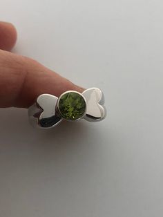 Rich bright Peridot green ring Sterling silver Tarnished with age, can be polished up. Size 7 can be sized by my jeweler. His service charge is $10-$20 All rings are shipped free in the US in a nice gift box. Check out our over a THOUSAND great reviews Engraving is $4 per letter and is not always perfect depending on the piece. It can take a few days if the jeweler is busy. This is payable to Paypal Judithsltd@gmail.com Lime Green Gemstone Birthstone Ring As Gift, Lime Green Gemstone Birthstone Ring For Gift, Lime Green Birthstone Ring As A Gift, Green Peridot Birthstone Ring For May, Lime Green Sterling Silver Rings As Gift, Lime Green Sterling Silver Rings For Gift, Peridot Rings In Lime Green As Gift, Lime Green Peridot Rings For Gift, Lime Green Peridot Rings For Gifts